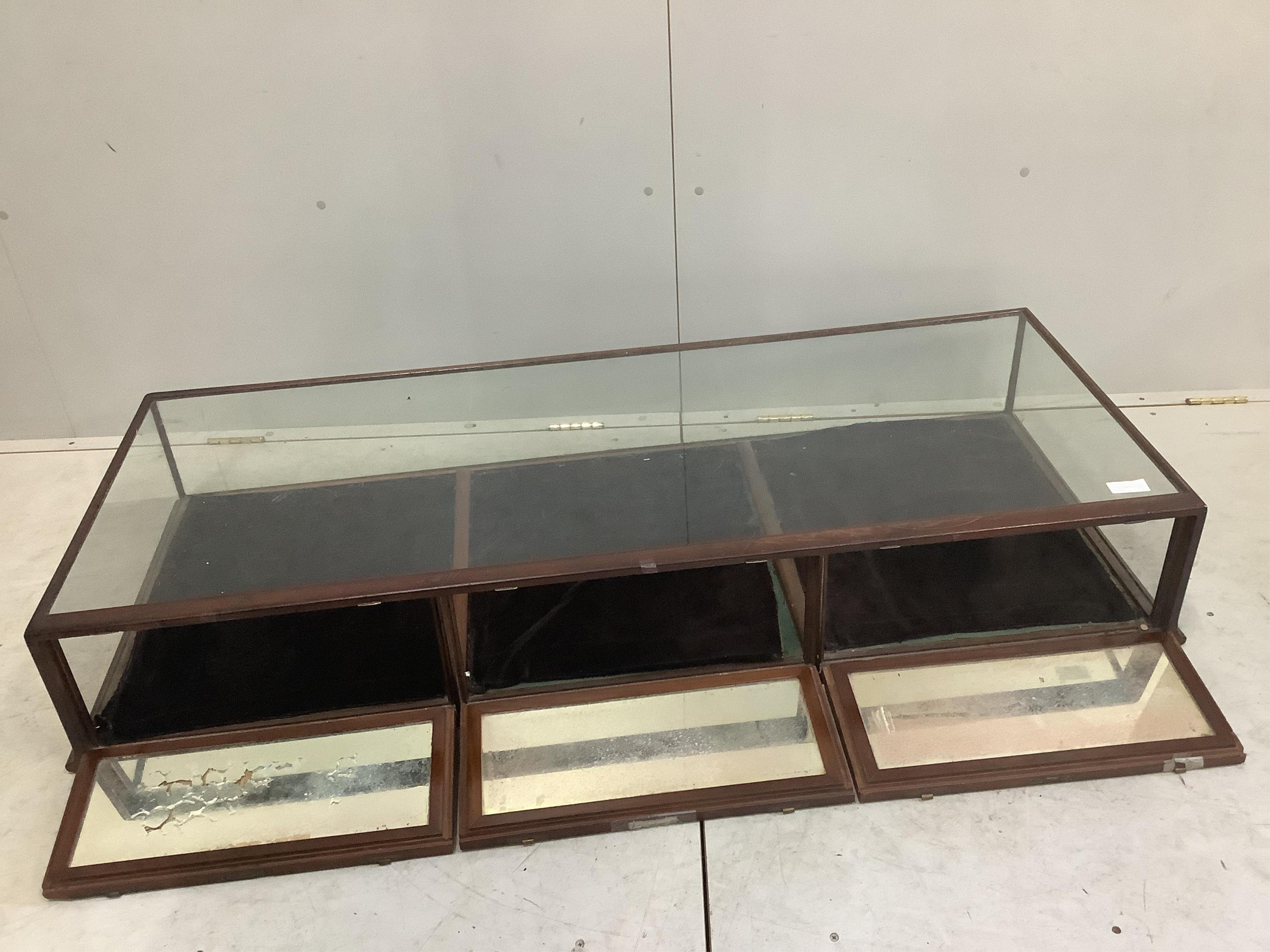 Two late 19th / early 20th century mahogany table top display cases, larger width 151cm, depth 61cm, height 25cm. Condition - poor